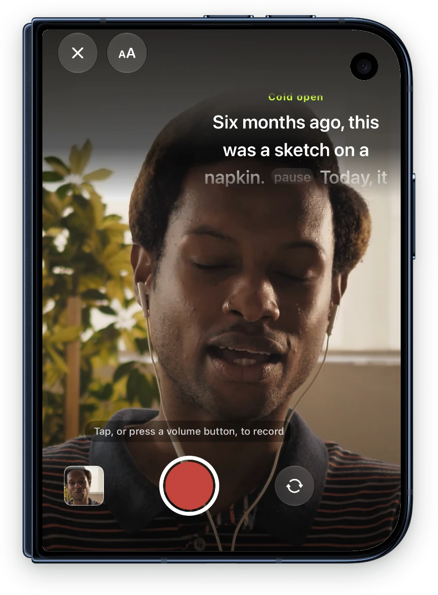 iPhone Duo folded while recording: the presenter on camera with the script in a band under the lens